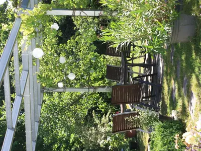 Ein Garten an der Unterkunft Apartment Wohlfühloase für Natur- und Gartenliebhaber by Interhome