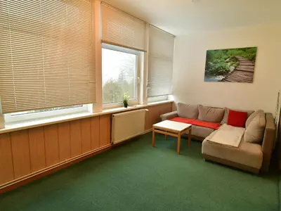 Ein Sitzbereich in der Unterkunft Apartment Große und moderne Ferienwohnung im Erdgeschoss by Interhome