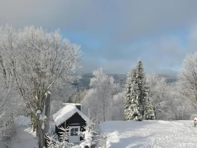 Apartment mit Garten und Spielplatznutzung by Interhome im Winter