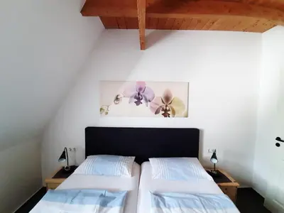 Ein Bett oder Betten in einem Zimmer der Unterkunft Apartment Fewo Stricker 12 by Interhome