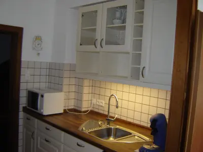 Küche/Küchenzeile in der Unterkunft Holiday Home Freistehendes Ferienhaus in ruhiger Lage by Interhome