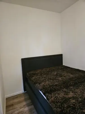 Ein Bett oder Betten in einem Zimmer der Unterkunft FM-Hahnenklee