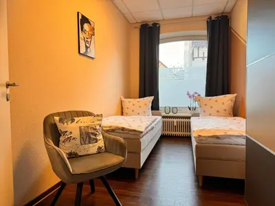 Ein Bett oder Betten in einem Zimmer der Unterkunft Ferienwohnung 