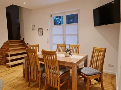 Ein Sitzbereich in der Unterkunft Holiday apartment Ida