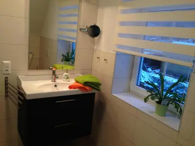 Ein Badezimmer in der Unterkunft Ferienwohnung Hellerling