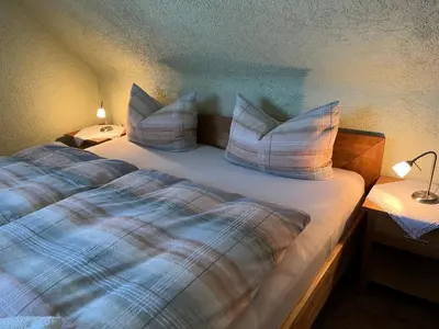Ein Bett oder Betten in einem Zimmer der Unterkunft Ferienwohnung Dorle