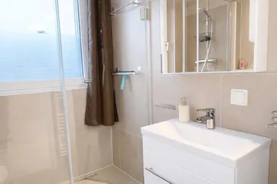 Ein Badezimmer in der Unterkunft PrimeLoft 