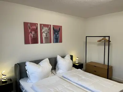 Ein Bett oder Betten in einem Zimmer der Unterkunft Ferienwohnung Bergwurm mit Balkon