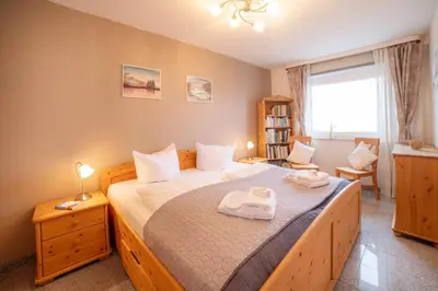 Ein Bett oder Betten in einem Zimmer der Unterkunft Schnuckeliges Appartement