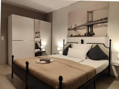 Ein Bett oder Betten in einem Zimmer der Unterkunft FeWo ElMI Komfortwohnung mit Blick in die Natur - 2 Schlafzimmer - 2 Bäder - inklusive Parkplatz - inklusive Aufzug