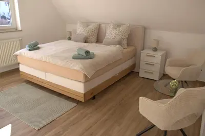 Ein Bett oder Betten in einem Zimmer der Unterkunft Ferienhaus Sonnenblick Wernigerode