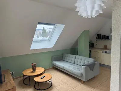 Ein Sitzbereich in der Unterkunft Magdalena Apartment 2