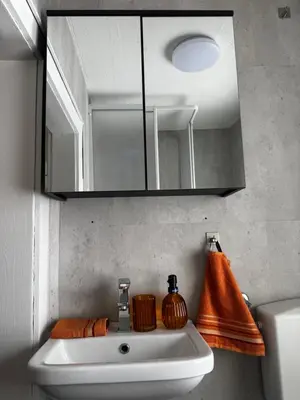 Ein Badezimmer in der Unterkunft Edelholz