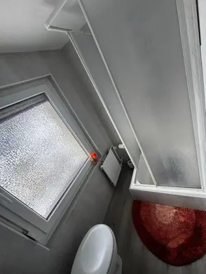 Ein Badezimmer in der Unterkunft Edelholz