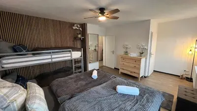 Ein Bett oder Betten in einem Zimmer der Unterkunft Ferienwohnungen Grubenweg 8 Bad Harzburg