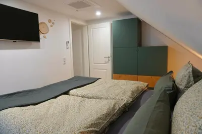 TV/Unterhaltungsangebot in der Unterkunft FeWo27 im Sagenharz - 4 Sterne DTV - stilvolles Family-Apartment, 2 SZ, Klima, WLAN & Netflix