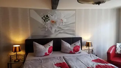 Ein Bett oder Betten in einem Zimmer der Unterkunft Ratsstübchen