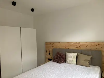 Ein Bett oder Betten in einem Zimmer der Unterkunft Villa Schlossblick II - Zeit zum Genießen in exklusivem Studio 