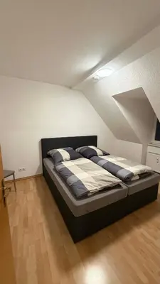 Ein Bett oder Betten in einem Zimmer der Unterkunft The Apartment Burgstrasse 6, Wernigerode