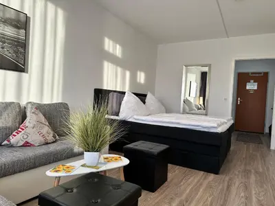 Ein Sitzbereich in der Unterkunft Modern Seeblick Balkon 2 Min zur Gondel