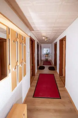 Ein Bett oder Betten in einem Zimmer der Unterkunft Pension und China - Thai Restaurant Asia - Haus