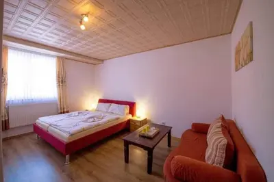 Ein Bett oder Betten in einem Zimmer der Unterkunft Pension und China - Thai Restaurant Asia - Haus