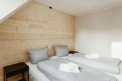 Ein Bett oder Betten in einem Zimmer der Unterkunft Harzcharlet Brockenbahn - Ganzes Haus