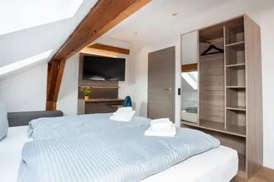 Ein Bett oder Betten in einem Zimmer der Unterkunft Lieblingsquartier 15