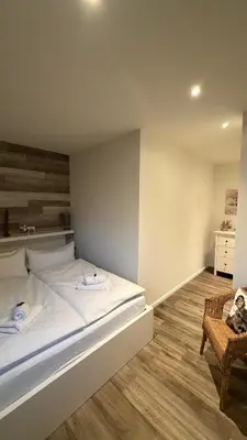 Ein Bett oder Betten in einem Zimmer der Unterkunft Mühls Apartments