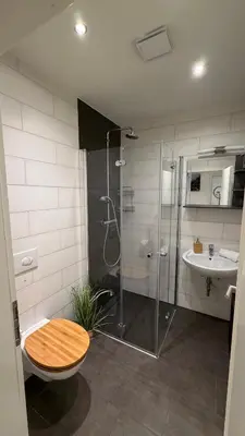 Ein Badezimmer in der Unterkunft Mühls Apartments