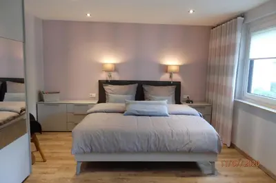Ein Bett oder Betten in einem Zimmer der Unterkunft Ferienwohnung 