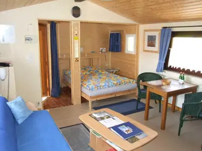 Ein Bett oder Betten in einem Zimmer der Unterkunft Ferienhaus Walnuss-Hütte
