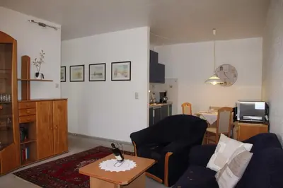 Ein Sitzbereich in der Unterkunft Appartement Scharf 