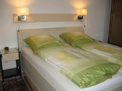 Ein Bett oder Betten in einem Zimmer der Unterkunft Ferienwohnung Harzburg-City