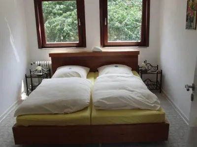 Ein Bett oder Betten in einem Zimmer der Unterkunft Ferienwohnung Haus Pietscher