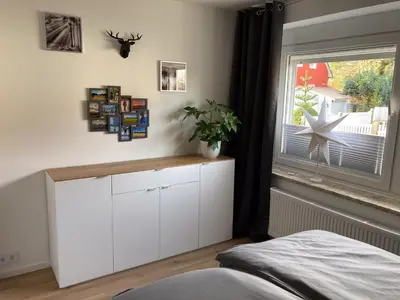 Ein Bett oder Betten in einem Zimmer der Unterkunft Ferienwohnungen bei der Purpurbuche