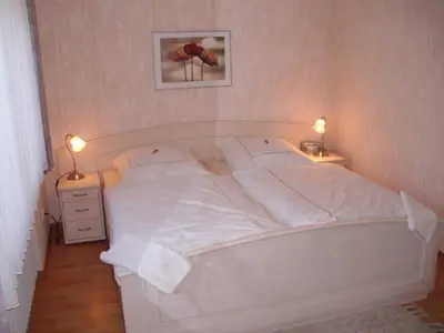 Ein Bett oder Betten in einem Zimmer der Unterkunft Ferienwohnungen Valentin