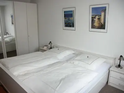 Ein Bett oder Betten in einem Zimmer der Unterkunft Ferienwohnungen Valentin