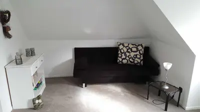 Ein Sitzbereich in der Unterkunft Ferienwohnung Villa Seyfried