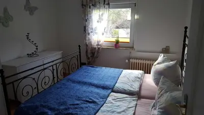 Ein Bett oder Betten in einem Zimmer der Unterkunft Ferienwohnung Villa Seyfried