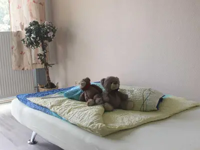 Ein Bett oder Betten in einem Zimmer der Unterkunft Ferienwohnung Todic