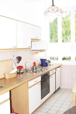 Küche/Küchenzeile in der Unterkunft Ferienwohnung Residenz am Badepark Nikolaus