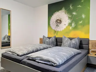 Ein Bett oder Betten in einem Zimmer der Unterkunft Ferienwohnung Forest Life