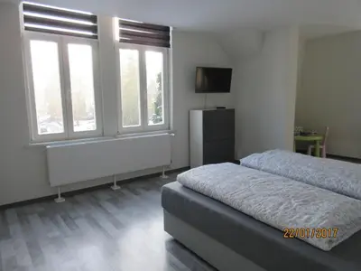 Ein Bett oder Betten in einem Zimmer der Unterkunft FeWo Witt - Annenburg