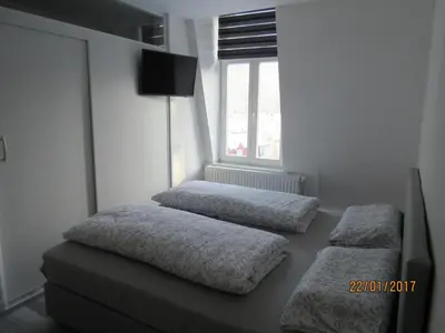 Ein Bett oder Betten in einem Zimmer der Unterkunft FeWo Witt - Annenburg