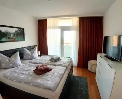 Ein Bett oder Betten in einem Zimmer der Unterkunft Ferienwohnung Kristin Pohl