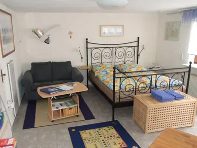Ein Sitzbereich in der Unterkunft Ferienwohnung Glück Auf