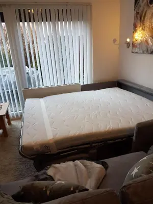 Ein Bett oder Betten in einem Zimmer der Unterkunft Ferienwohnung Bergblüte