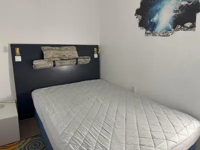 Ein Bett oder Betten in einem Zimmer der Unterkunft Apartment Ferienapartm- Adler by Interhome