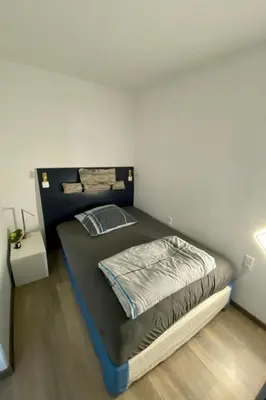 Ein Bett oder Betten in einem Zimmer der Unterkunft Apartment Ferienapartm- Adler by Interhome